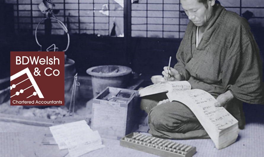 Accountant using abacus and ledger, BDWelsh logo displayed.